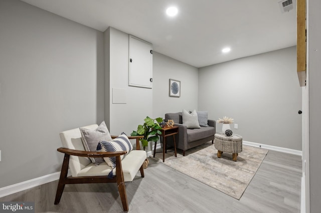 living area featuring light hardwood / wood-style floors