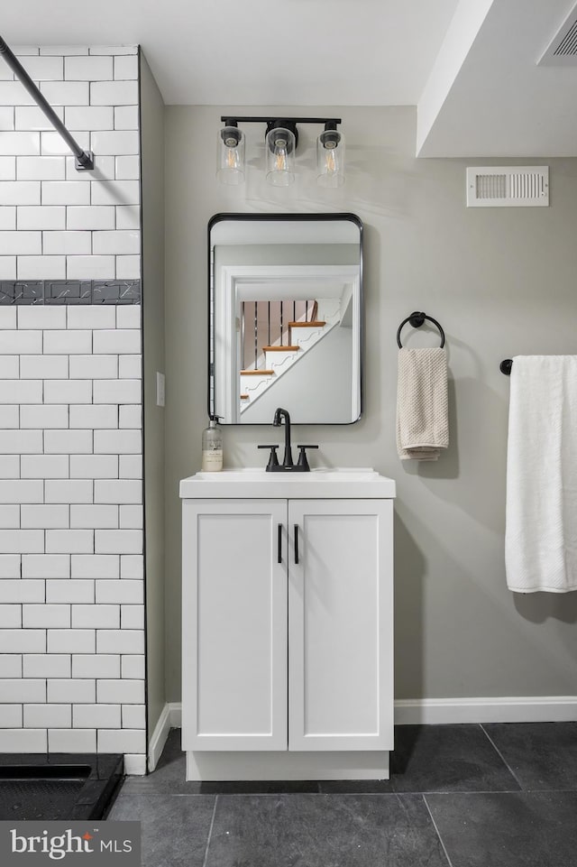 bathroom with vanity and walk in shower