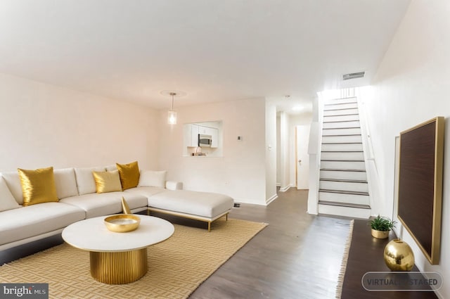 living room with wood-type flooring