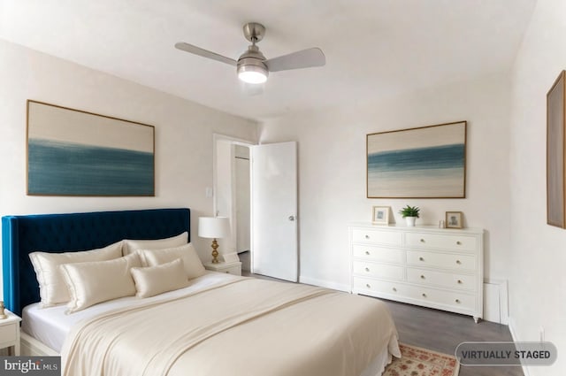 bedroom featuring dark wood-type flooring and ceiling fan