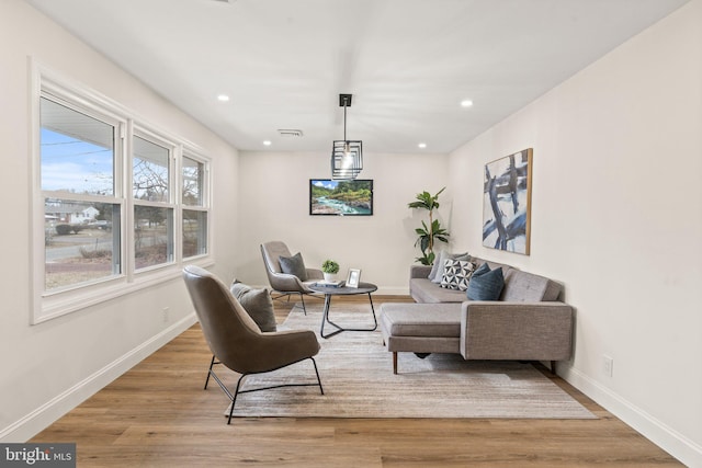 sitting room featuring light wood-type flooring