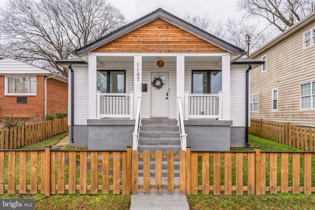 bungalow-style home featuring covered porch