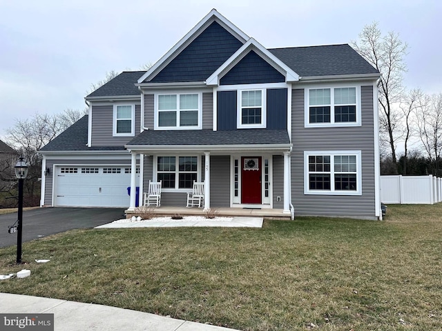 view of front facade with a front yard and a porch