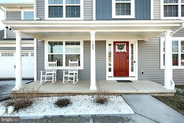 entrance to property featuring covered porch