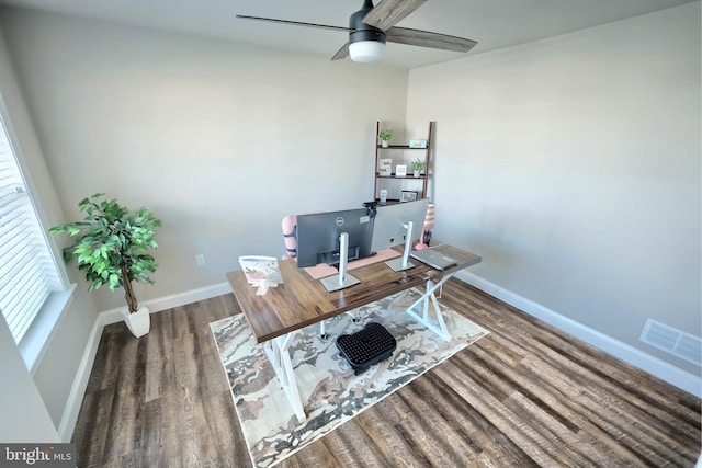 home office featuring ceiling fan and dark hardwood / wood-style flooring