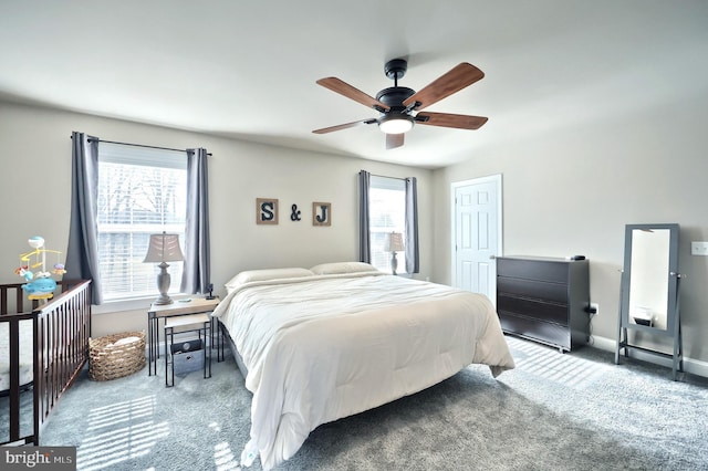 carpeted bedroom featuring ceiling fan