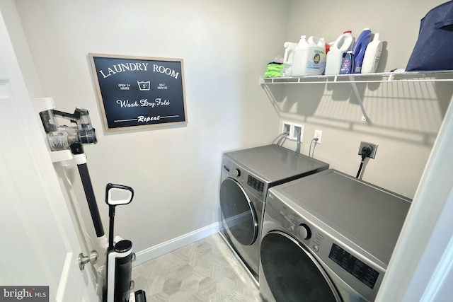 washroom featuring washer and dryer