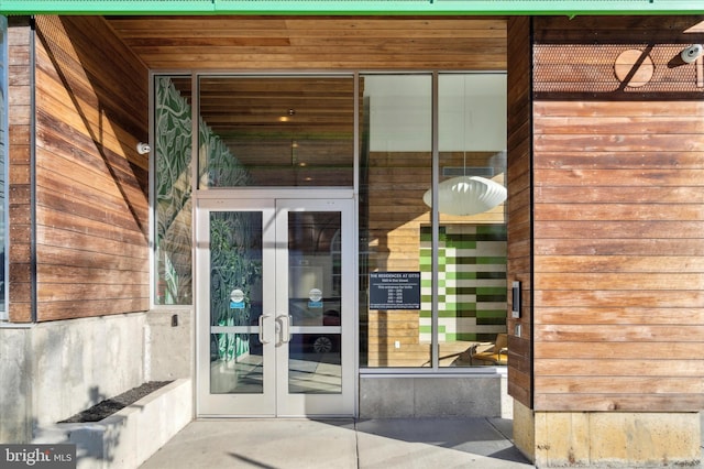 doorway to property featuring french doors