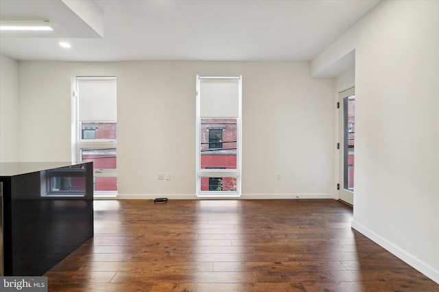 1501 N 31st St Unit 205, Philadelphia, PA 19121 - unfurnished room with dark wood-type flooring, recessed lighting, and baseboards