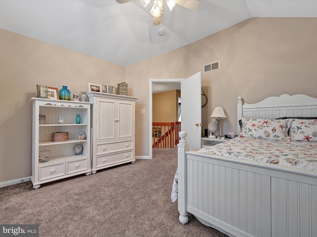 carpeted bedroom with lofted ceiling and ceiling fan