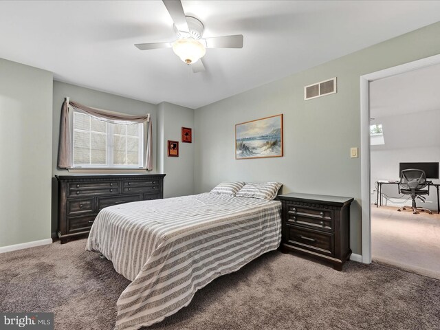 bedroom with ceiling fan and light colored carpet