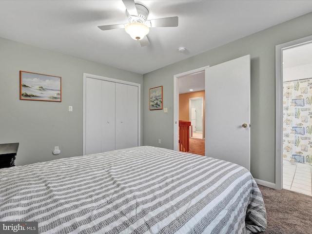 carpeted bedroom featuring connected bathroom, a closet, and ceiling fan