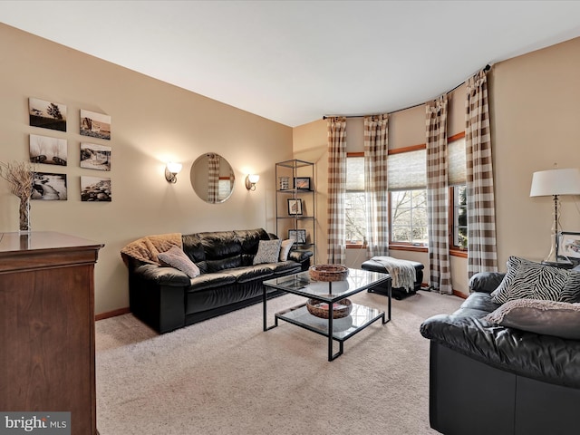 living room featuring light colored carpet