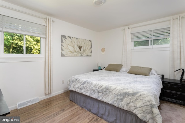 bedroom featuring light hardwood / wood-style flooring