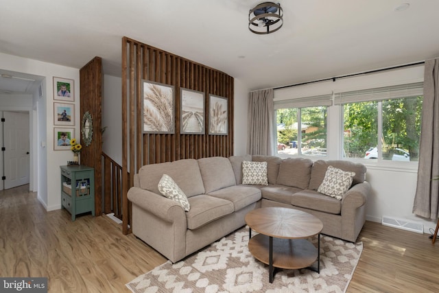 living room with light hardwood / wood-style floors