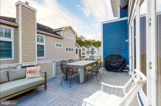 deck featuring an outdoor living space