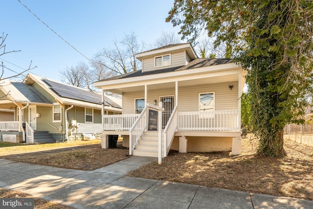 view of front of property featuring covered porch