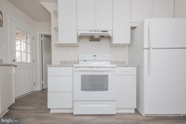 kitchen with white cabinetry, white appliances, light stone countertops, and light hardwood / wood-style floors