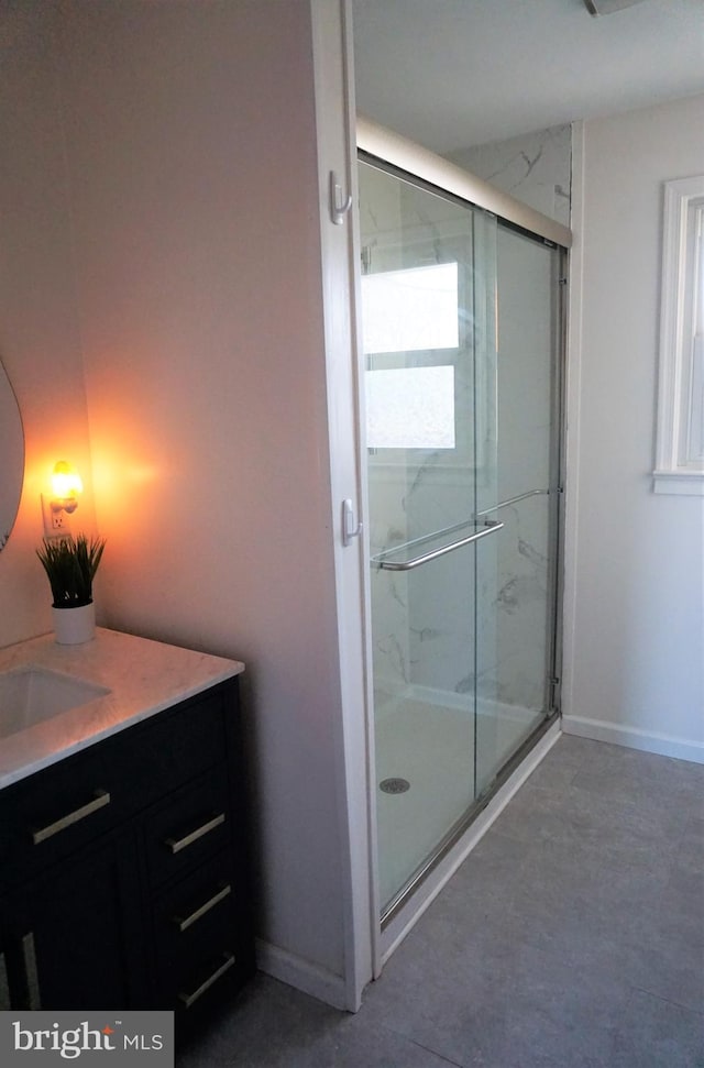 bathroom featuring vanity and walk in shower