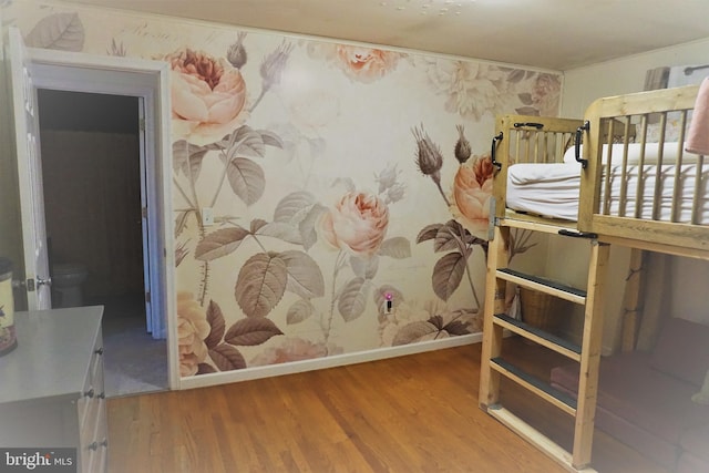 bedroom featuring hardwood / wood-style floors