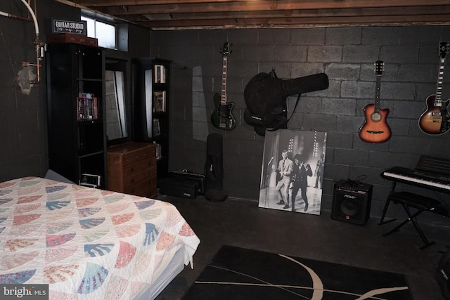 bedroom with concrete floors