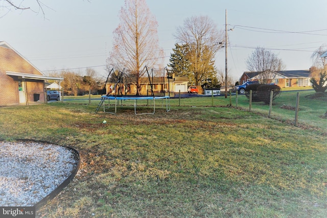 view of yard featuring a trampoline