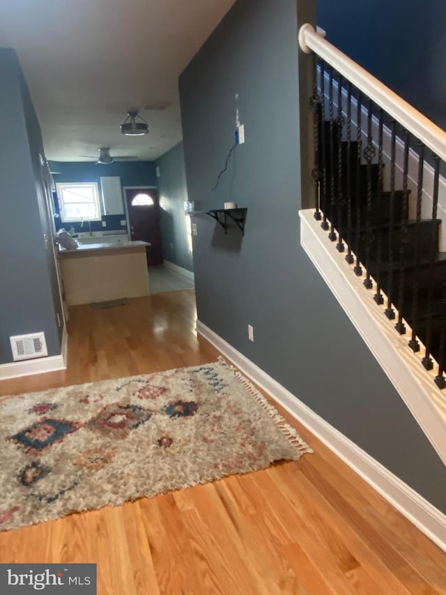 hall featuring hardwood / wood-style floors