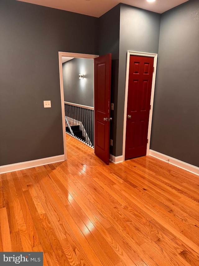 unfurnished room featuring light hardwood / wood-style flooring