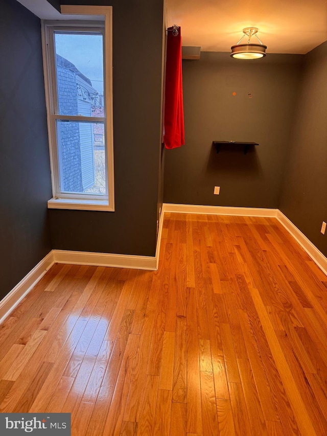 empty room with light wood-type flooring