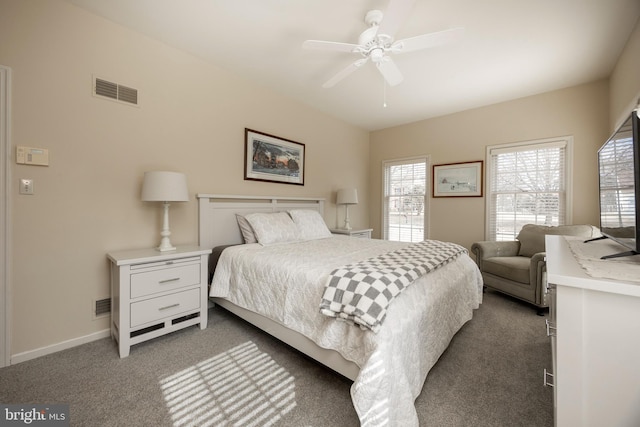 bedroom featuring ceiling fan and dark colored carpet