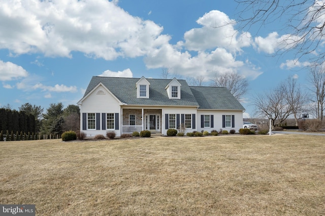 cape cod house with a front lawn and a porch