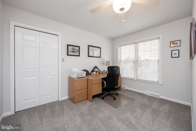 home office featuring carpet flooring and ceiling fan