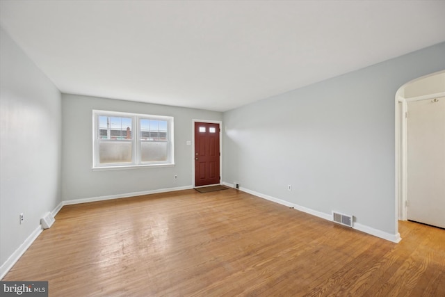 entrance foyer with light hardwood / wood-style flooring