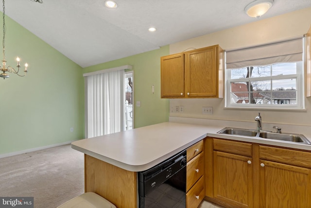 kitchen with sink, hanging light fixtures, black dishwasher, light colored carpet, and kitchen peninsula