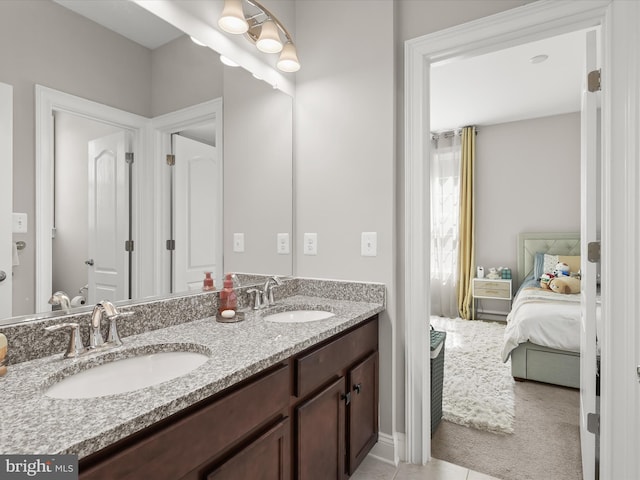 bathroom featuring tile patterned floors and vanity