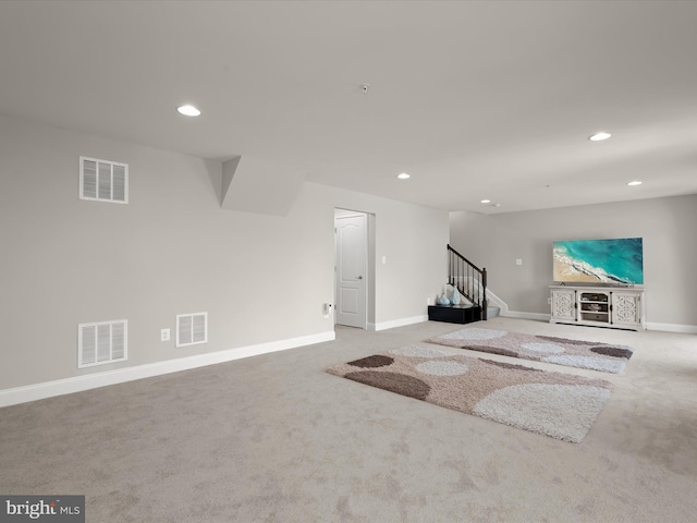 living room with light colored carpet