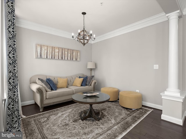 living room with ornamental molding, dark hardwood / wood-style flooring, and ornate columns