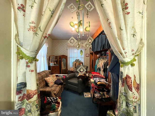 sitting room featuring carpet floors