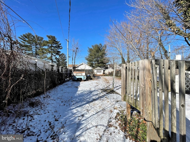 view of yard covered in snow