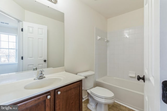 full bathroom with washtub / shower combination, vanity, and toilet