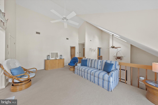 living room with carpet floors, high vaulted ceiling, visible vents, and a ceiling fan