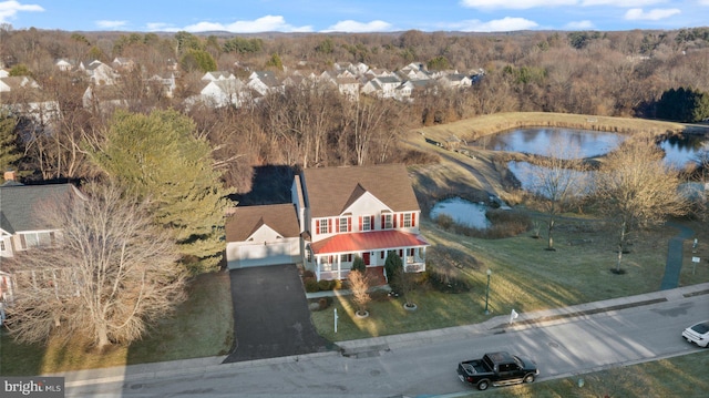 bird's eye view with a water view