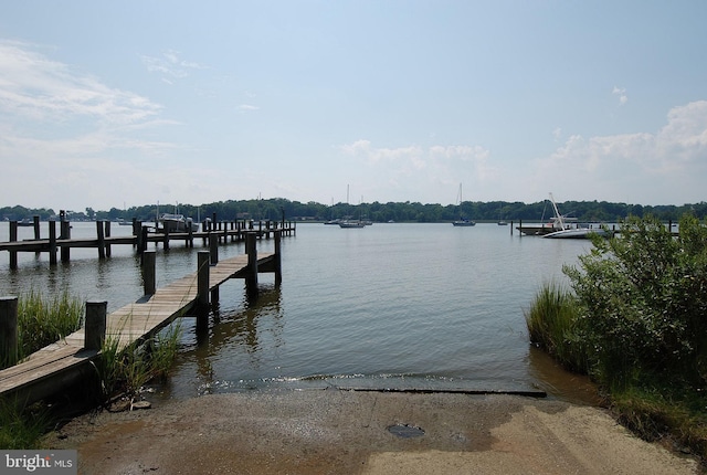 view of dock with a water view