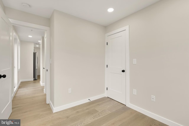 hallway featuring light hardwood / wood-style flooring