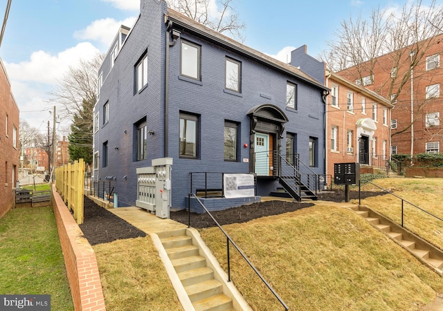 view of front facade with a front lawn