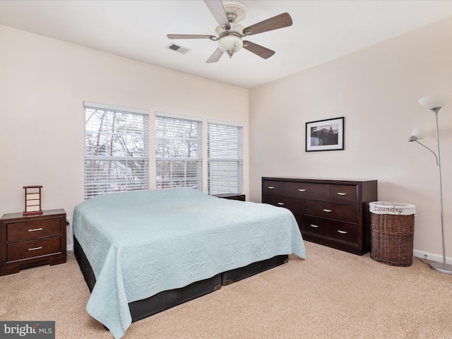 carpeted bedroom featuring ceiling fan