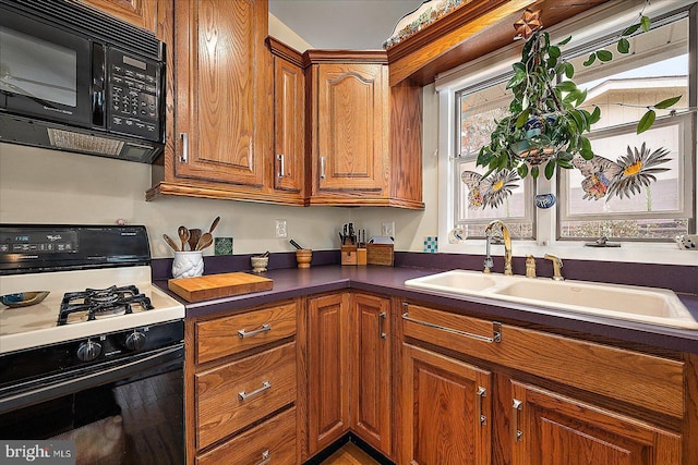 kitchen with sink and gas stove