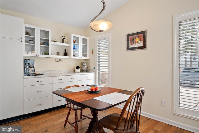 dining room with light hardwood / wood-style flooring