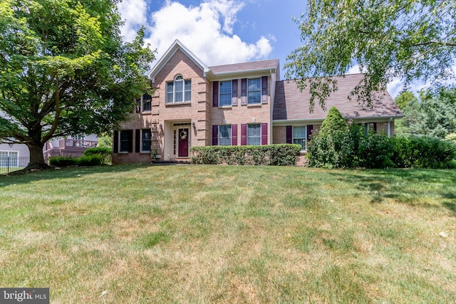 view of front of home with a front lawn