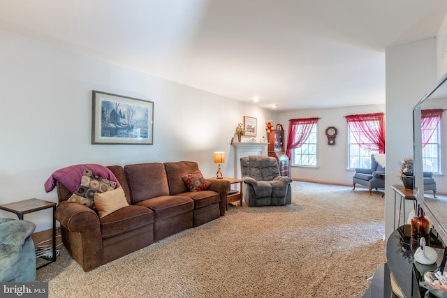 living room featuring light carpet